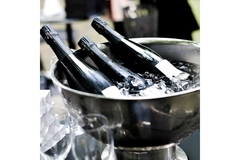 Champagne in ice bucket.